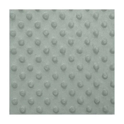 Green changing pad cover with a textured dot pattern, designed for baby bedding.
