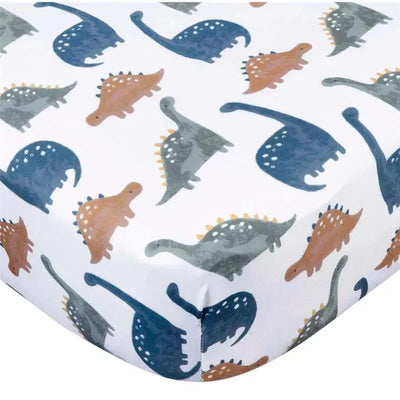 Knit crib sheet featuring a colorful dinosaur print in blue, green, and brown on a white background.