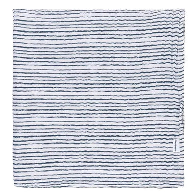 Muslin blanket featuring alternating striped patterns in white and navy blue, part of the Gerber Dino Time collection.