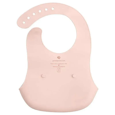 Light grapefruit-colored baby silicone scoop bib with a wide neck and two snap closures at the front.
