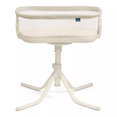 HALO BassiNest Swivel Sleeper 4.0 in Oat color with a mesh sides, a soft mattress, and adjustable height.