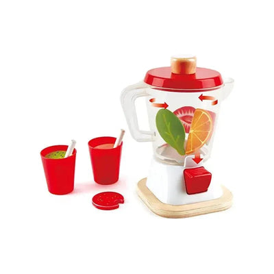 Toy smoothie blender with red and white design, featuring fruits and vegetables inside, two red cups, and a removable lid.
