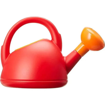 Red plastic watering can with an orange spout, designed for sand and beach play.