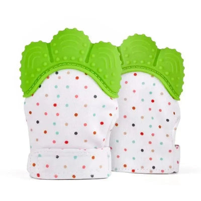 Silicone teether mitten for babies in green and white, featuring a textured grip and colorful polka dots.