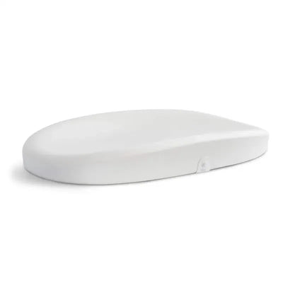 White changing pad and scale designed for baby care, featuring a smooth, contoured surface and a modern design.