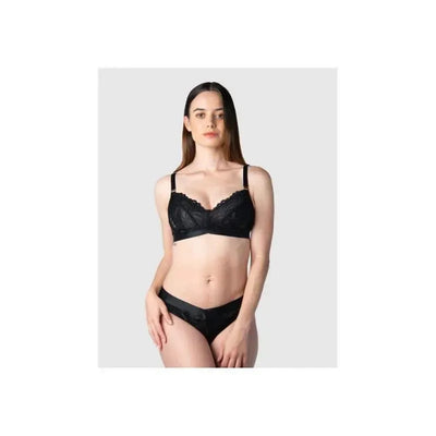 Multifit wirefree nursing bra in black, featuring lace detailing, worn by a model standing confidently.