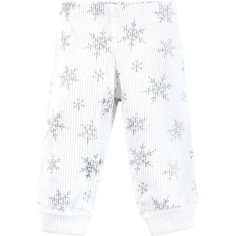 Preemie thermal short sleeve layette set featuring soft white pants with a snowflake pattern and ribbed cuffs.
