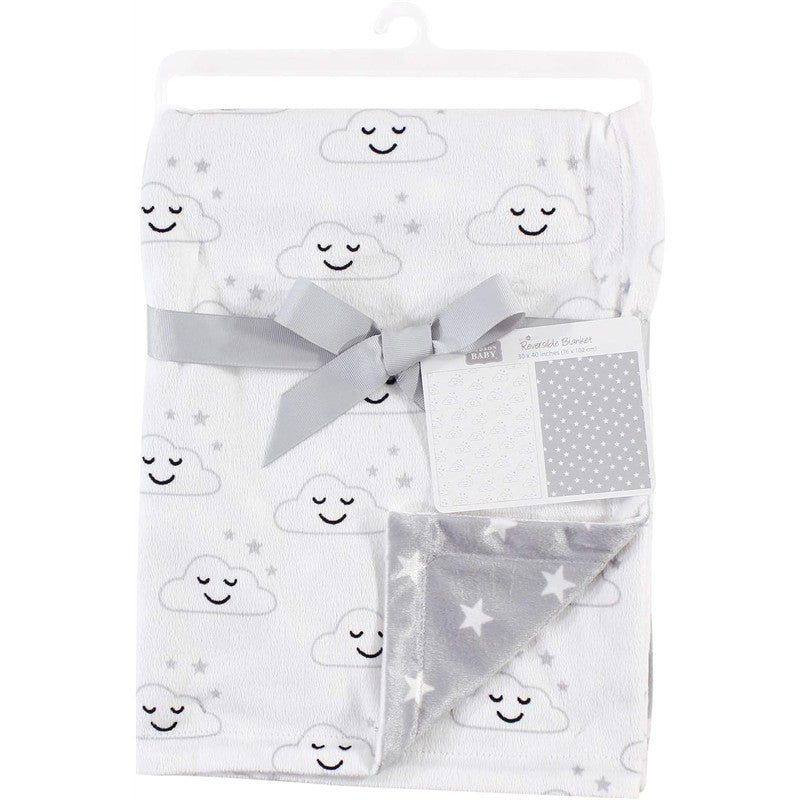 Reversible gray mink blanket with smiling cloud pattern on one side and star pattern on the other, tied with a ribbon.