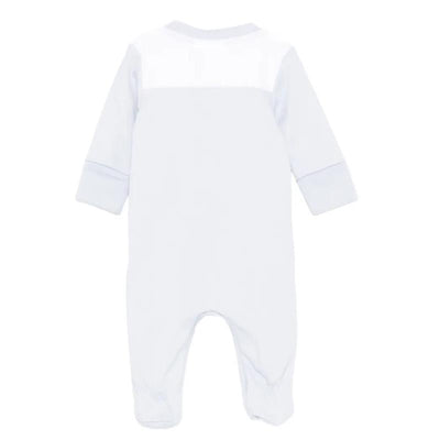 Pale blue baby boy footie with long sleeves and a white panel on the back, designed for comfort and style.