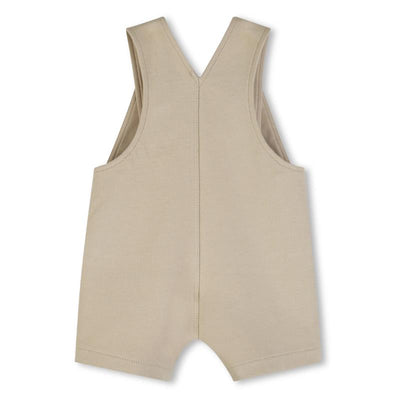 Cotton shortalls for boys in a stone color, featuring a sleeveless design and a V-back.