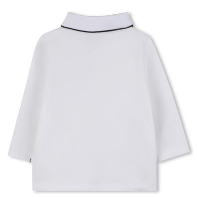 Long sleeve white polo shirt for boys by Hugo Boss, featuring a classic collar with a black trim detail.