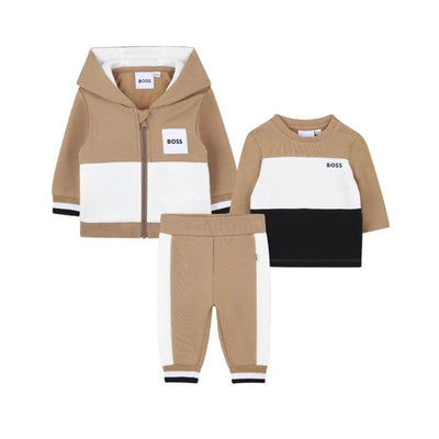 Hugo Boss beige tracksuit set for boys featuring a zip-up hooded jacket, long-sleeve tee, and matching pants.