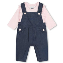 Long sleeve pink tee paired with denim overalls featuring buttons and pockets, part of the Hugo Boss Baby set.