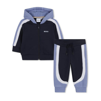 Navy jogging pants and hooded cardigan set by Hugo Boss, featuring contrasting light blue and white stripes.