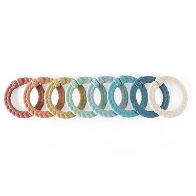 Set of eight colorful silicone linking rings in pastel shades, designed for baby toys or sensory play.