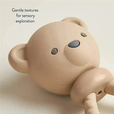 Bear Sweetie Rattle™ featuring soft, gentle textures for sensory exploration, designed for infants.
