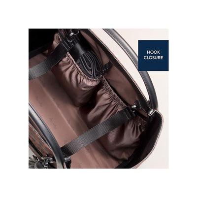 Interior view of the Itzy Ritzy Boss Tote Diaper Bag in leopard print, highlighting pockets and hook closure.