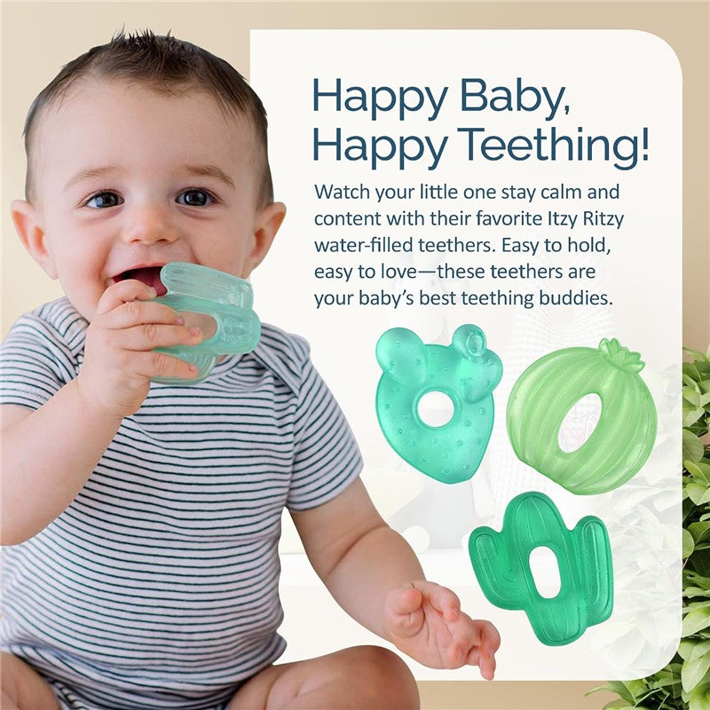 Infant smiling while holding a teal cactus-shaped teether, with two other teething toys visible nearby.