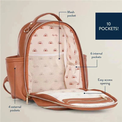 Mini Plus Diaper Bag in cognac with a soft interior, showcasing 10 pockets (4 external, 6 internal) and a mesh pocket.