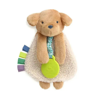 Plush puppy lovey with a soft cream body, colorful tags, and a green teething ring.