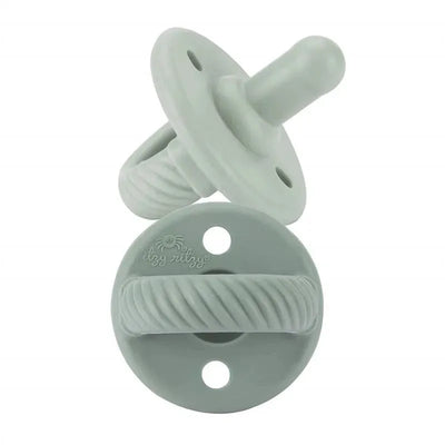 Silicone pacifiers from Itzy Ritzy, featuring agave and succulent cable designs in a soft green color.