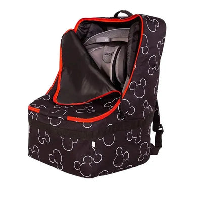 Padded travel bag for car seats featuring a black design with white Mickey Mouse outlines and red trim.