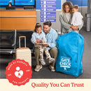 Neon blue J.L. Childress stroller gate check bag beside a family at an airport, with a parent reading to a child.