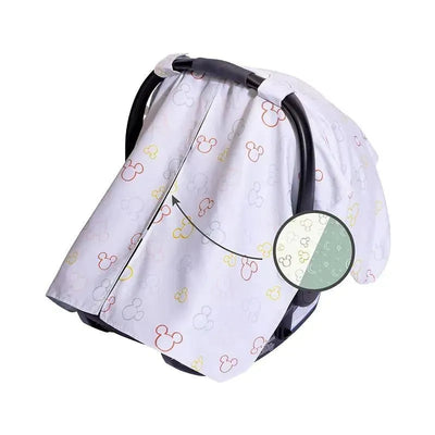 Reversible infant car seat canopy featuring a multicolor Mickey Mouse design, providing shade and privacy for babies.