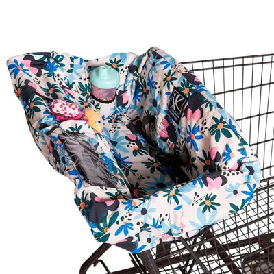 Shopping cart and high chair cover featuring a Minnie Floral design, including toys and a sippy cup.
