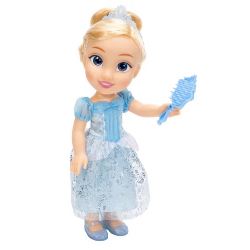 Cinderella doll wearing a light blue dress, holding a blue hairbrush, featuring large blue eyes and blonde hair.
