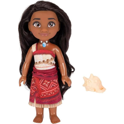 Moana Petite Doll featuring long black hair, wearing a traditional dress with a necklace, accompanied by a shell accessory.