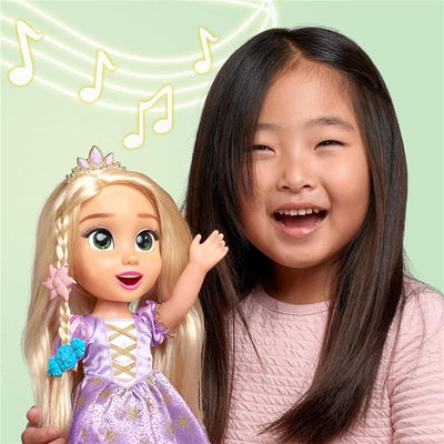 Rapunzel doll with glowing hair is held by a smiling girl, accompanied by musical notes on a light green background.