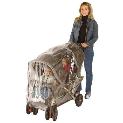 Weather shield for Jeep tandem stroller, shielding two children inside with a clear cover while a woman pushes it.