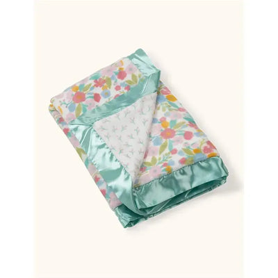 Reversible baby blanket featuring a floral design on one side and a soft, mint green satin border.