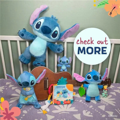Collection of Disney Baby Lilo & Stitch toys, including plush Stitch figures, a soft book, and a toy ukulele on a patterned mat.