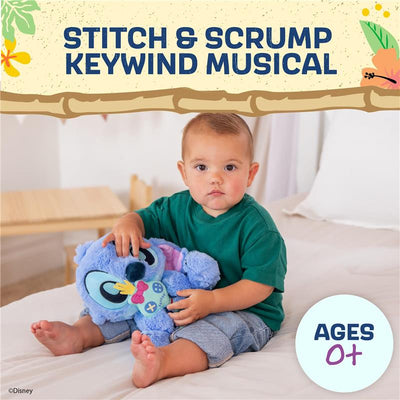 Disney Baby Stitch with Scrump key wind musical plush toy held by a young child, with text indicating ages 0+.