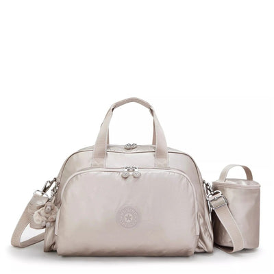 Metallic glow Kipling Camama baby bag with dual zipper, front pocket, and detachable bottle holder.