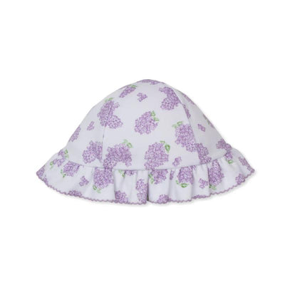 Lilac floppy hat featuring a floral pattern of lilac flowers, complemented by a ruffled brim.