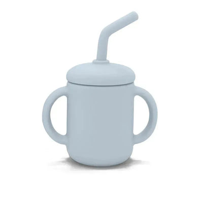 Blue silicone cup with handles and spill-proof straw, designed for infants; holds 4 oz.