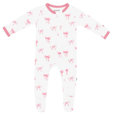 Baby girl zippered footie in white with pink bows, featuring long sleeves and pink trim.