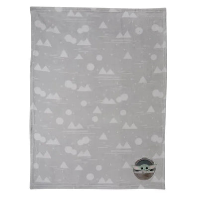 Baby blanket featuring a soft gray design with triangles and circles, highlighted by an appliqued Baby Yoda in a pod.