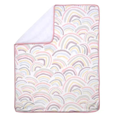 Baby blanket by Lambs & Ivy featuring a pastel rainbow pattern with a plush white underside.