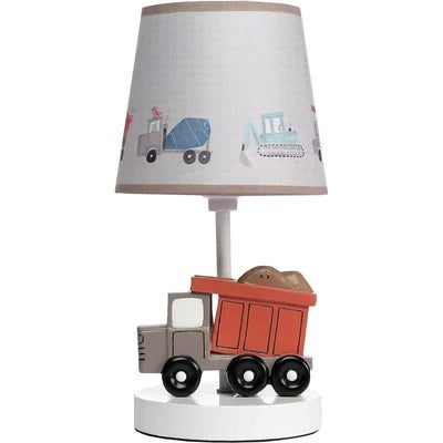 Construction-themed lamp featuring a truck-shaped base, a gray shade with illustrations of various construction vehicles, and includes a bulb.