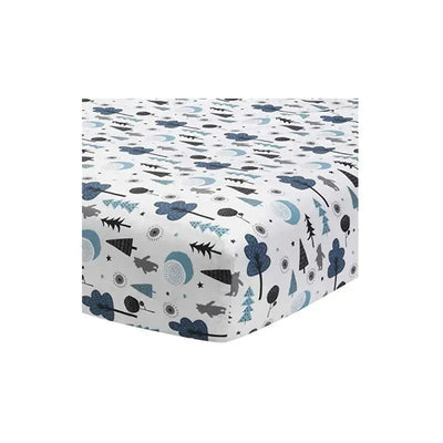 Fitted crib sheet featuring white background with blue and gray forest-themed patterns, including trees and bears.