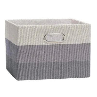 Foldable storage bin in gray ombre with a silver handle, ideal for organizing and decor.