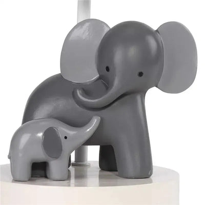 Gray elephant lamp featuring a larger and smaller elephant figurine, designed for nursery decor.