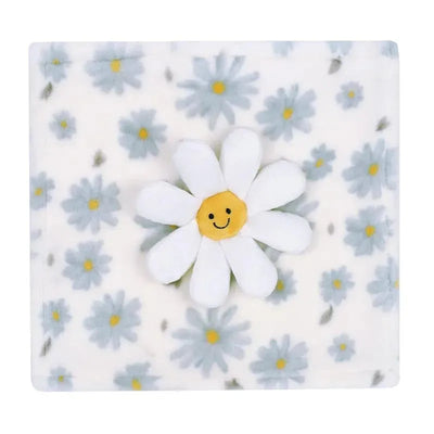 Security blanket featuring a smiling daisy appliqué on a plush fabric with a floral pattern in soft blue and white.