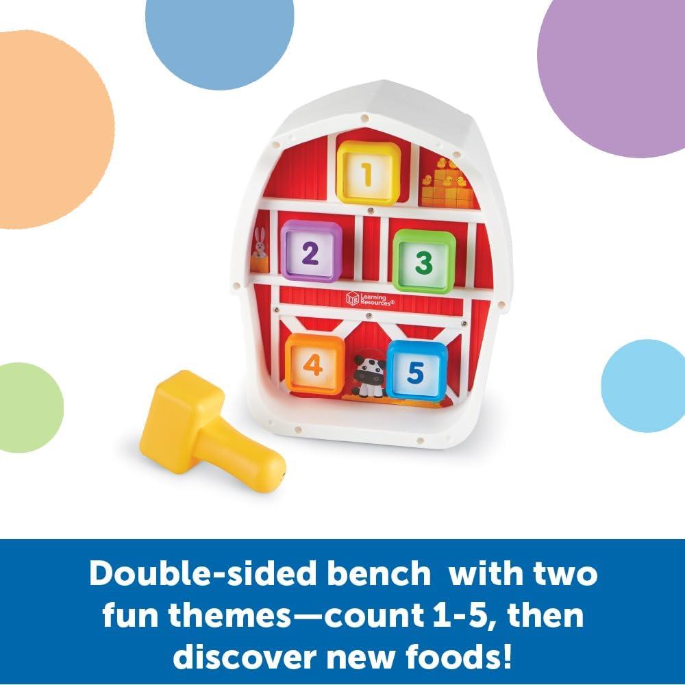 Learning Resources Barnyard Pounding Bench with colorful counting blocks numbered 1-5 and a yellow hammer for interactive play.