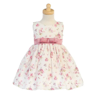 Cotton floral print dress for girls featuring a sleeveless design and a pink bow at the waist.
