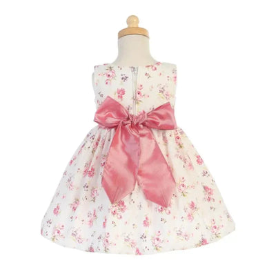Cotton floral print dress for baby girls, featuring a pink bow at the waist and a sleeveless design.